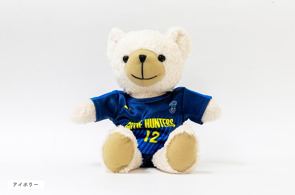 サッカーユニフォームを着たベア